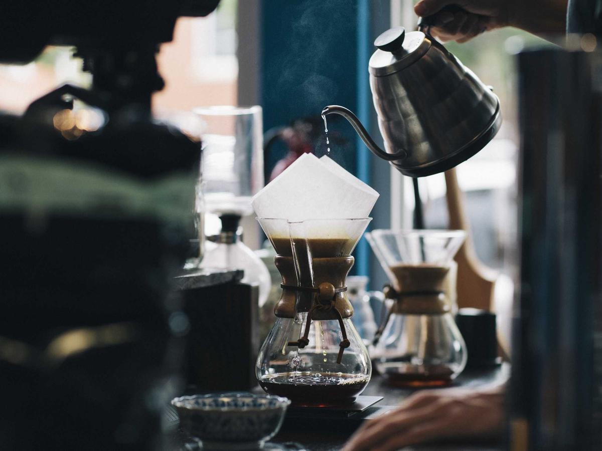 Pour-over coffee on a wooden bar